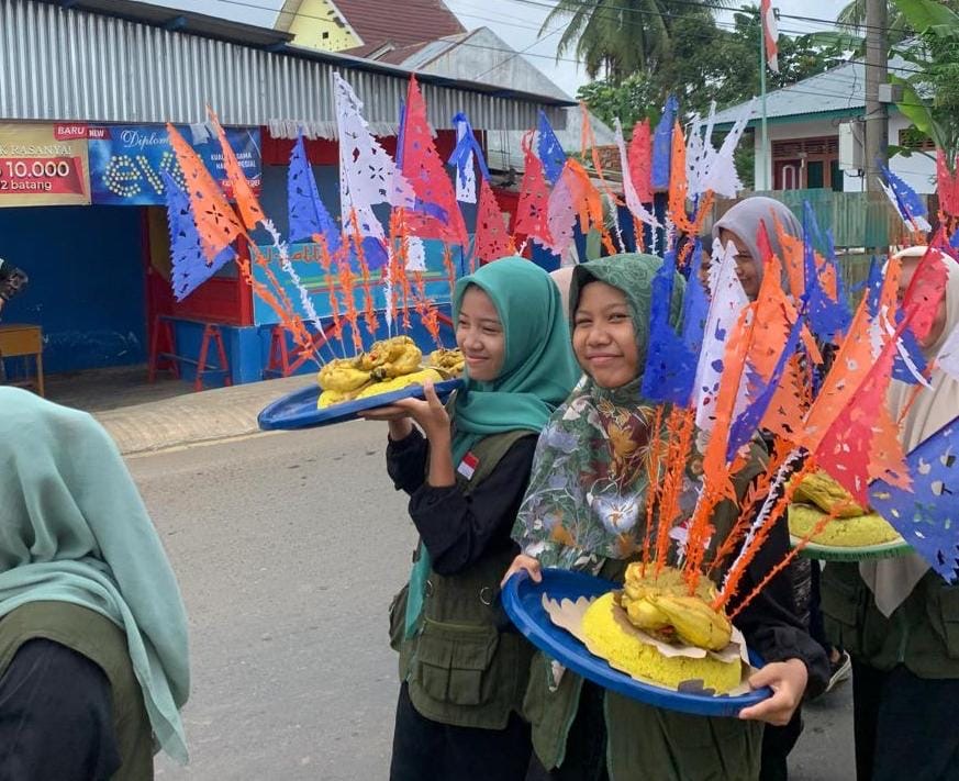 Warga Jalan Talang Kering Gelar Pawai Jambar Nasi Kuning Peringati Maulid Nabi Muhammad SAW