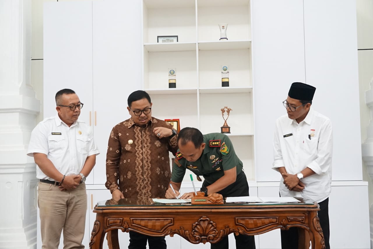 Bersinergi Ciptakan Pilkada Damai, Pemkot Bengkulu Teken NPHD Bersama Kodim 0407