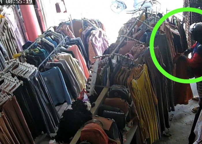 Seorang Wanita Maling Pakaian, Aksinya Terekam CCTV